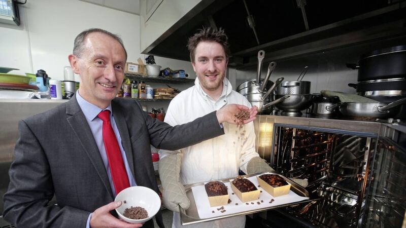 Eamon Taggart, trading manager at Henderson Group is pictured with Tim Graham of Graham&#39;s Bakery, one of the three local bakeries who are collaborating with Henderson Wholesale to produce the new enjoy local bakery range. 