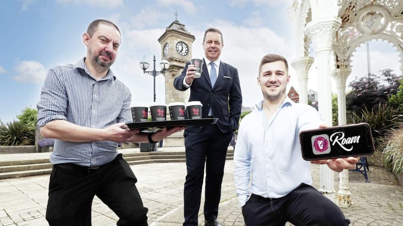 L-R: David Ervin from The Red Berry Coffee House and Eatery; Glyn Roberts, Retail NI; and Andrew Bartlett, Roam Local founder. 