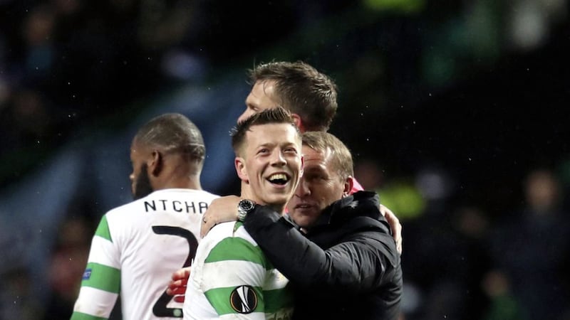 Celtic manager Brendan Rodgers hugs match-winner Callum McGregor 