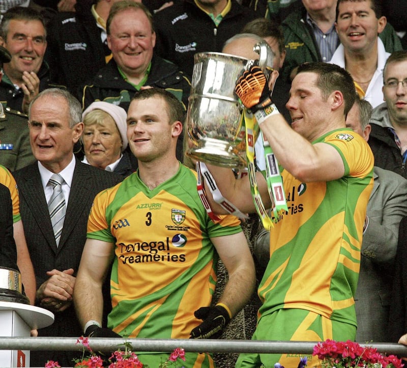 Neil McGee looks on as Kevin Cassidy lifts the Anglo Celt Cup in 2011. The pair would win Allstars together later that year but not the All-Ireland they dreamed of after Jim McGuinness&#39;s decision to cut Cassidy that winter. Picture by Seamus Loughran 