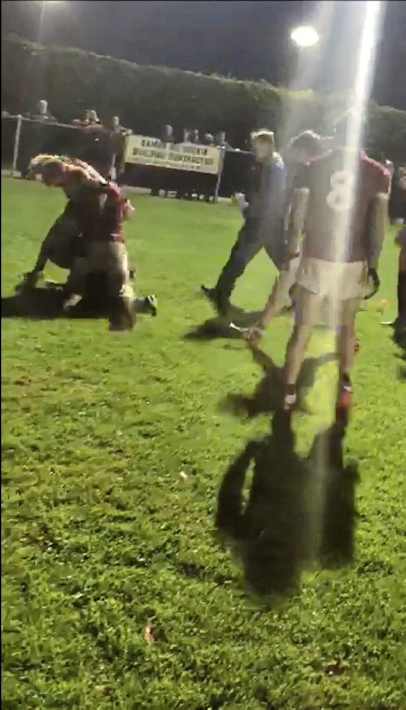 An on-pitch fight at a match between Slaughtneil and Ballinderry on Thursday 