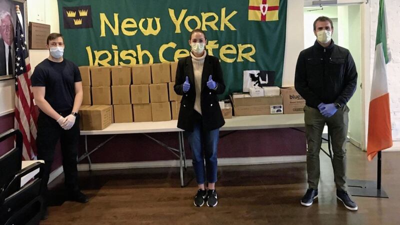 Sophie Colgan and fellow Meitheal volunteers Stephen Long and Brian Glynn collect PPE for New York health-care workers