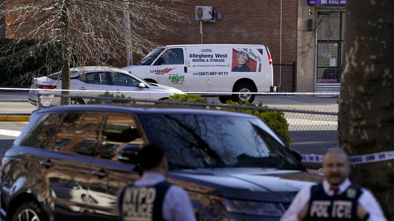 Emergency personnel form a perimeter around a U-Haul van during an ongoing investigation in the Brooklyn borough of New York, Tuesday, April 12, 2022 (AP Photo/John Minchillo)&nbsp;