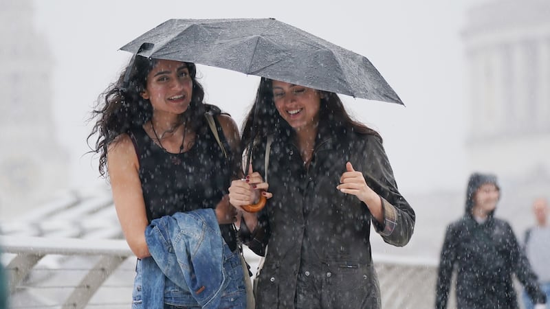 Half a month’s rain could fall in an hour in some parts of the UK as thunderstorms move across southern England, the Met Office has said (PA)