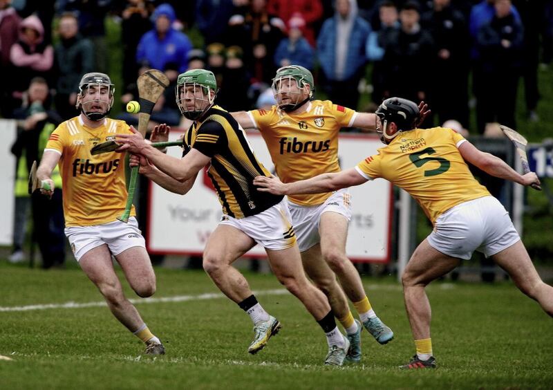 Kilkenny&#39;s Martin Keoghan tries to evade Antrim&#39;s Niall McKenna (centre) during Saturday&#39;ss NHL game at Corrigan Park Picture: Seamus Loughran 