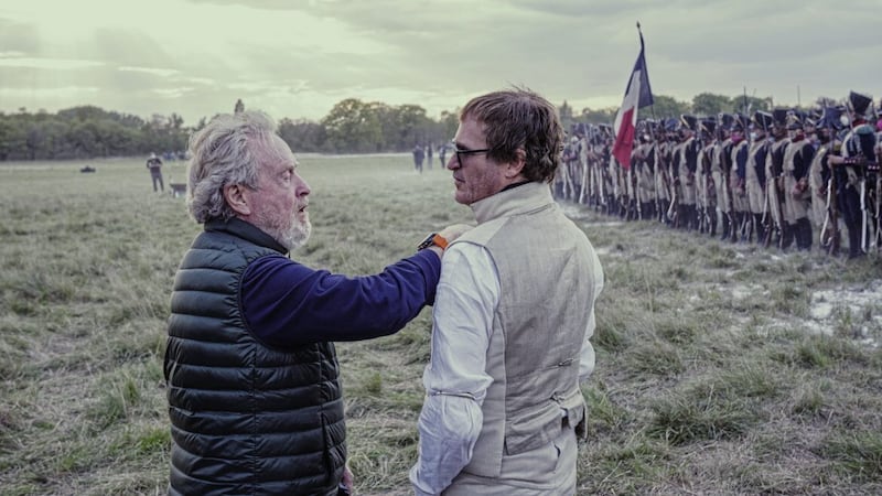 Director Ridley Scott and Joaquin Phoenix on the set of Napoleon 