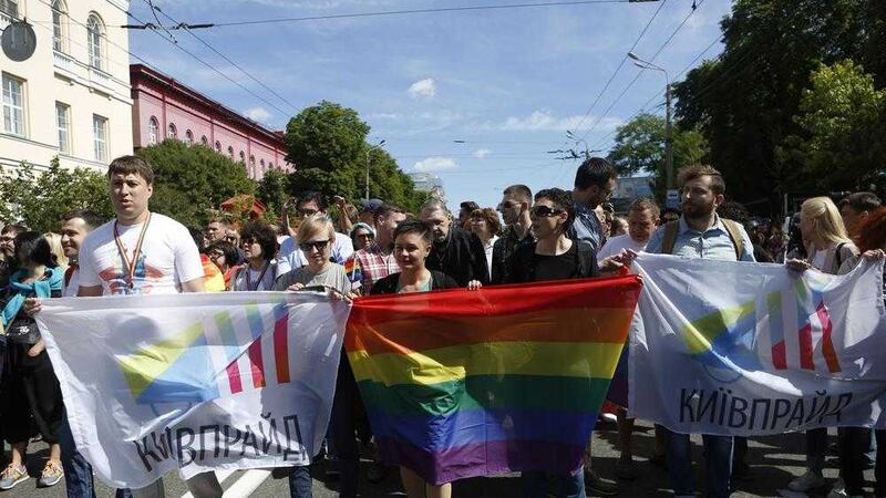 Ukrainian gay rights activists take part in a march in Kiev, Ukraine. Picture by Sergei Chuzavkov, Associated Press