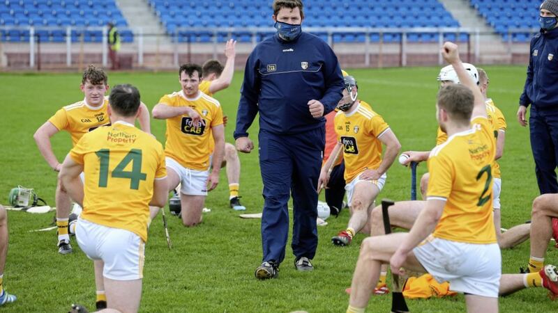 Antrim&#39;s senior hurling manager Darren Gleeson puts his players through their paces. Picture by Mal McCann. 
