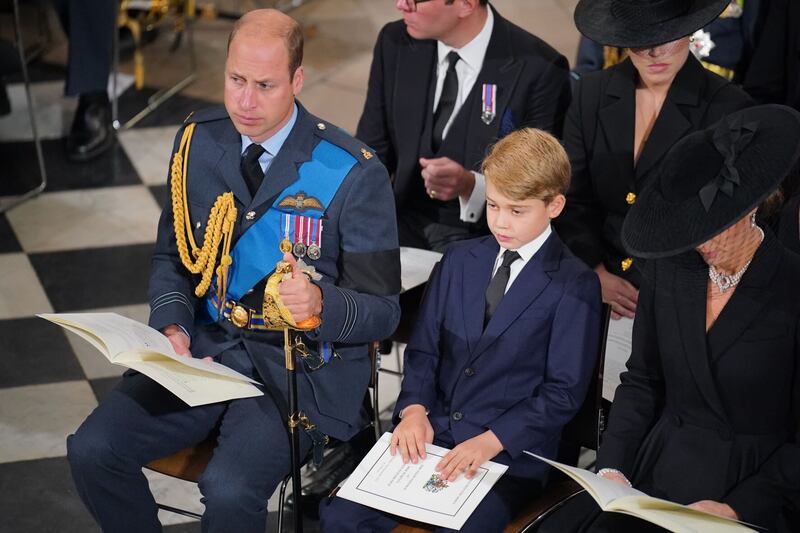 The Prince of Wales, Prince George and the Princess of Wales during her State Funeral of Queen Elizabeth II at the Abbey in London