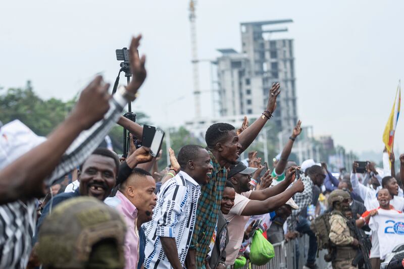Supporters of Felix Tshisekedi celebrate the victory of their candidate in Kinshasa (Samy Ntumba Shambuyi/AP)