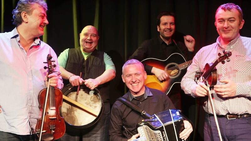 FOUR MEN AND DOG:  The thirty-three year old band are playing the Belfast Tradfest for the first time this year in a programme packed with superlative musicians and singers