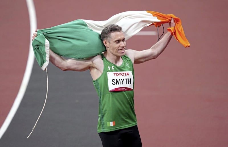 Jason Smyth celebrates winning the Men&#39;s 100m - T13 during the Athletics at the Olympic Stadium on day five of the Tokyo 2020 Paralympic Games in Japan. 