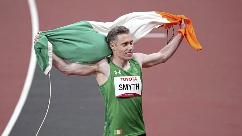 Jason Smyth celebrates winning the Men&#39;s 100m - T13 during the Athletics at the Olympic Stadium on day five of the Tokyo 2020 Paralympic Games in Japan. 