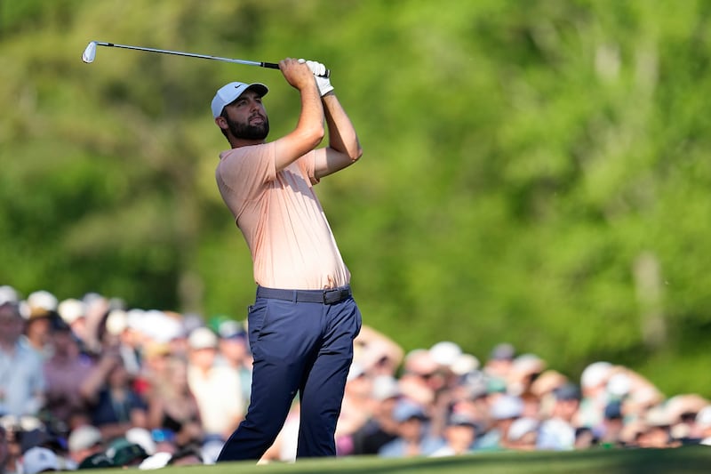 Scottie Scheffler watches his tee shot on the 12th hole during the final round of the Masters (George Walker IV/AP)