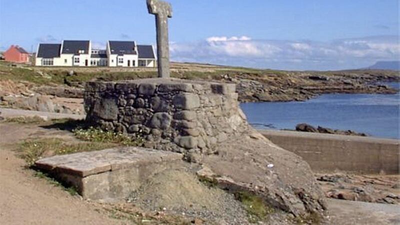The Tau Cross at the harbour on Tory island, off the coast of Donegal. 
