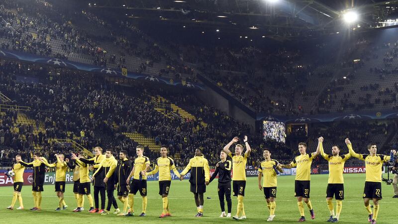 Borussia Dortmund's players celebrate after their Champions League Group F win over Legia Warsaw on Tuesday night<br />Picture by AP