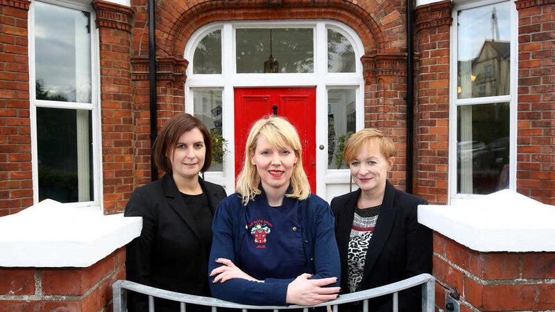 Julie Morrison, centre, of the Red Brick House with Jayne Foote, left, and Tracey Morrow of Ulster Bank 