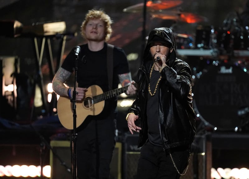 Ed Sheeran, left, performs with inductee Eminem during the Rock & Roll Hall of Fame induction ceremony at the Microsoft Theatre in Los Angeles