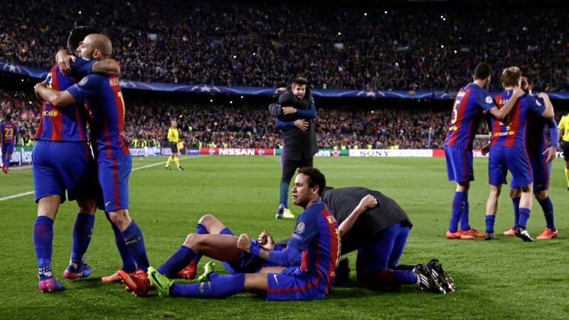 Barcelona players celebrate their incredible victory AP Photo/Emilio Morenatti 