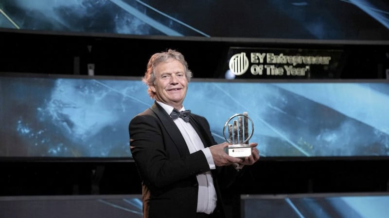 Tobermore&#39;s managing director, David Henderson, with his EY Industry Entrepreneur of the Year award. 