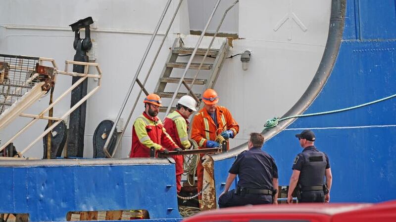 Police speak to crew on board the Polar Prince (Jordan Pettitt/PA)