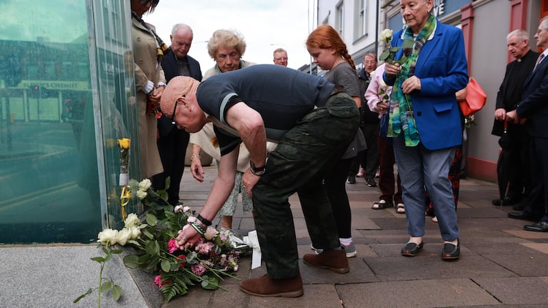 Kevin Skelton lays flowers at the site of the Omagh bombing to remember his wife Philomena (Liam McBurney/PA)