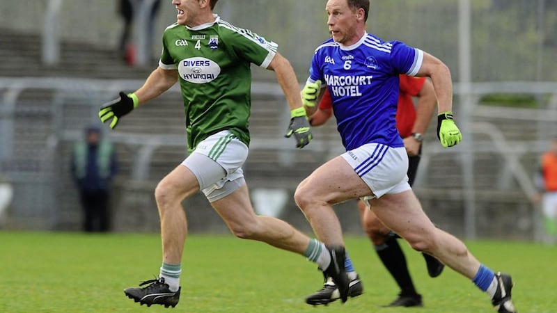 Eyes on the ball, as Christopher Mc Fadden (Gaoth Dobhair ) is chased by Anthony Thompson (Naomh Conaill) in the Donegal Senior Club Football final in McCumhaill Park, Ballybofey, Picture: Michael O&#39;Donnell. 