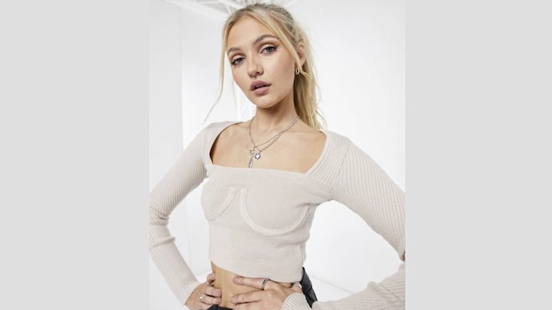 Stradivarius Corset Detail Knitted Top in Ecru, &pound;25.99; Trousers out of stock, ASOS 
