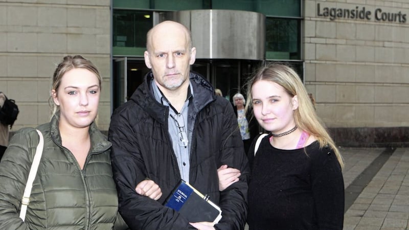 William Burns with his daughters Gemma and Courtney outside Laganside courts in Belfast after an inquest into the drugs-related death of his son Jamie. Picture by Matt Bohill 