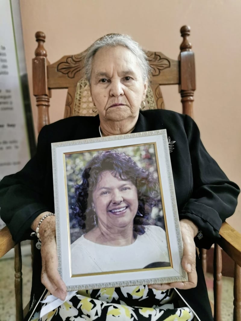 Austra Berta Flores holds a photograph of her murdered daughter, Berta C&aacute;ceres. Picture from Tr&oacute;caire