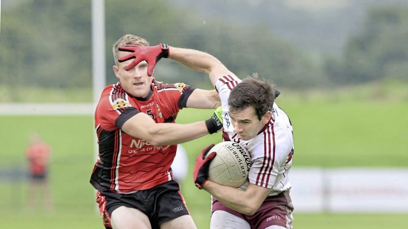 Benny Heron is a key player for Ballinascreen, but has been well marshalled by Brendan Rogers in recent meetings with Slaughtneil. Picture by Margaret McLaughlin 