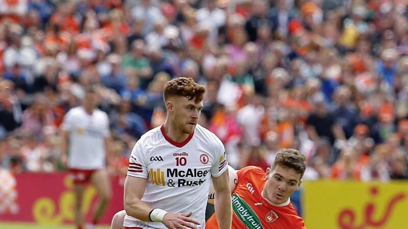 Armagh&#39;s Jarly &Oacute;g Burns and Tyrone&#39;s Conor Meyler in action during the GAA Football All-Ireland Senior Championship Round One at the Athletic Grounds. Pic by Philip Walsh. 