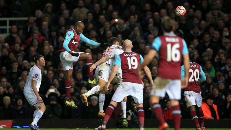 West Ham's Angelo Ogbonna scores the winner in extra-time during tonight's FA Cup fourth round replay match against Liverpool at Upton Park