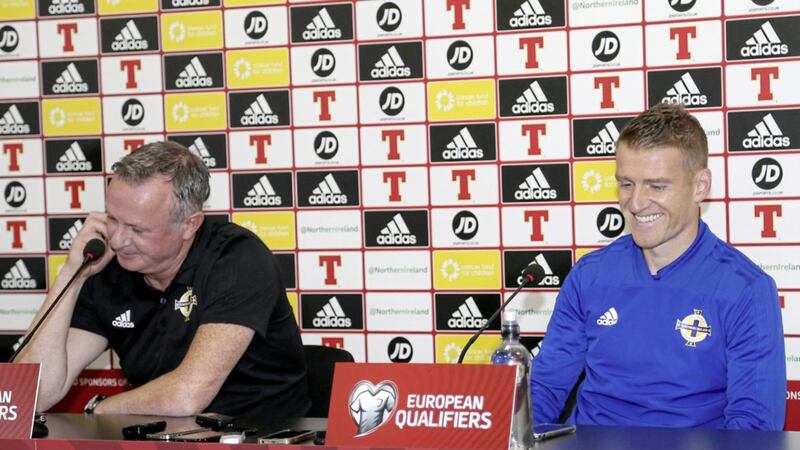 Northern Ireland captain Steven Davis has a laugh during a press conference with manager Michael O'Neill.<br /> Photo by David Maginnis/Pacemaker Press