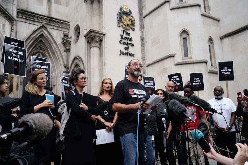 Andrew Malkinson, who served 17 years in prison for a rape he did not commit, reads a statement outside the Royal Courts of Justice in London after being cleared by the Court of Appeal