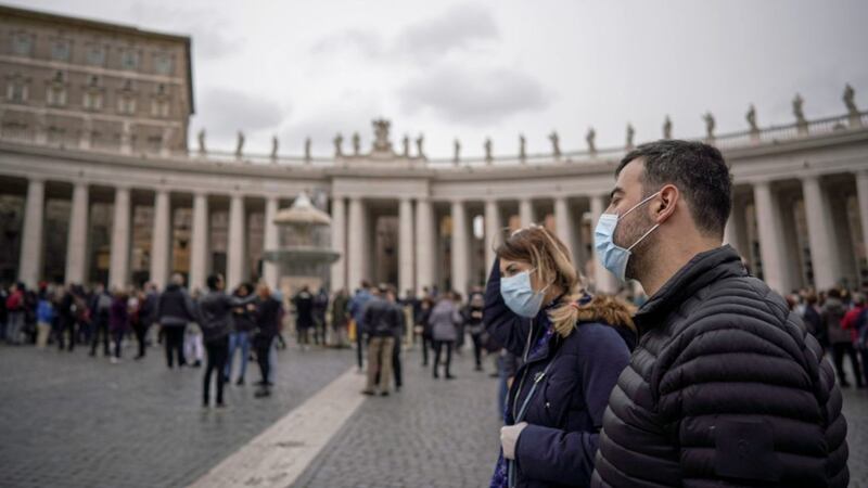 The faithful wear protective masks in St Peter's Square, at the Vatican earlier this week. Picture by Andrew Medichini, Associated Press
