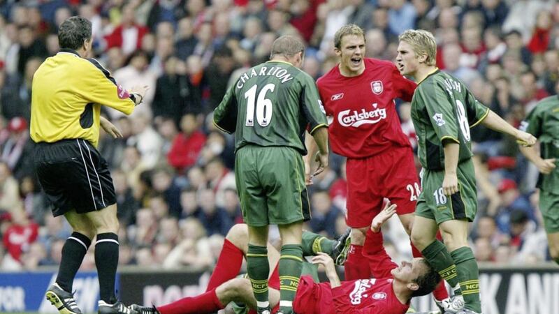 Norwich City&#39;s Paul McVeigh makes his feelings known to Liverpool&#39;s Dietmar Hamann and Stephen Warnock during a Premiership clash at Anfield. Picture by PA 