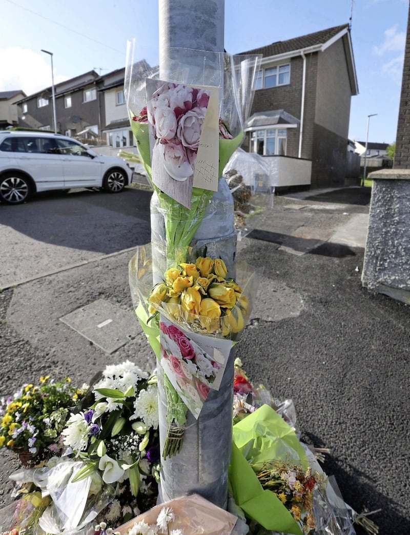 Two bunches of flowers and cards left by the family of Lyra McKee who visited the scene of the journalists murder in the Creggan Estate of Derry city. Picture Margaret McLaughlin 6-5-2019. 