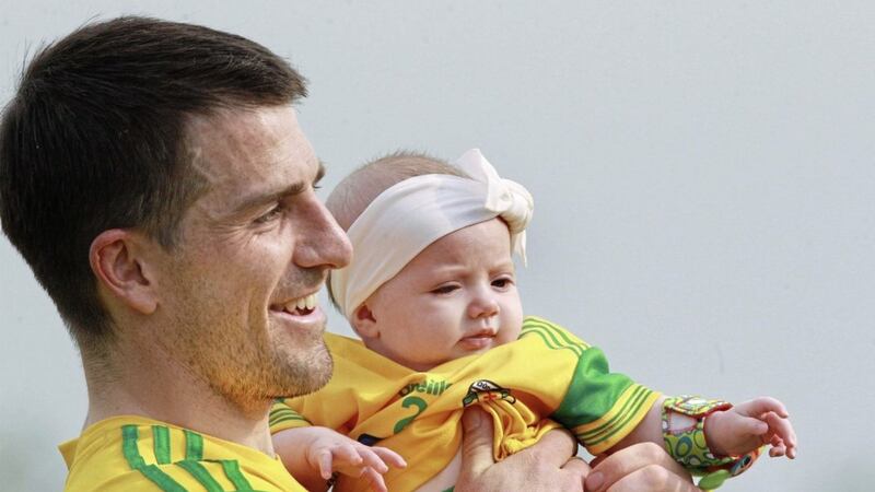 Donegal&#39;s Paddy McGrath with his baby daughter Isla Rose following the win over Derry during the Ulster SFC quarter-final at Celtic Park. Picture Margaret McLaughlin 