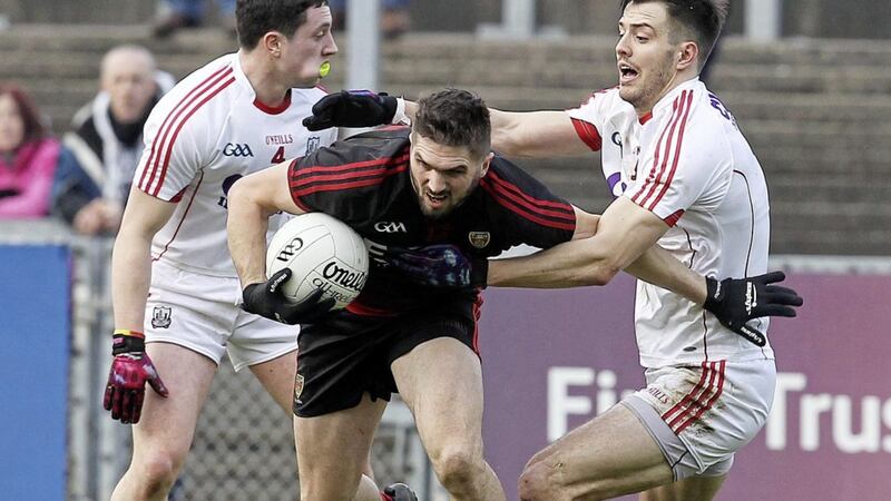 Connaire Harrison, pictured with Cork duo Jamie O&#39;Sullivan and Michael McSweeney, endured a frustrating day at Pairc Esler, culminating in a red card late on Picture by Philip Walsh 