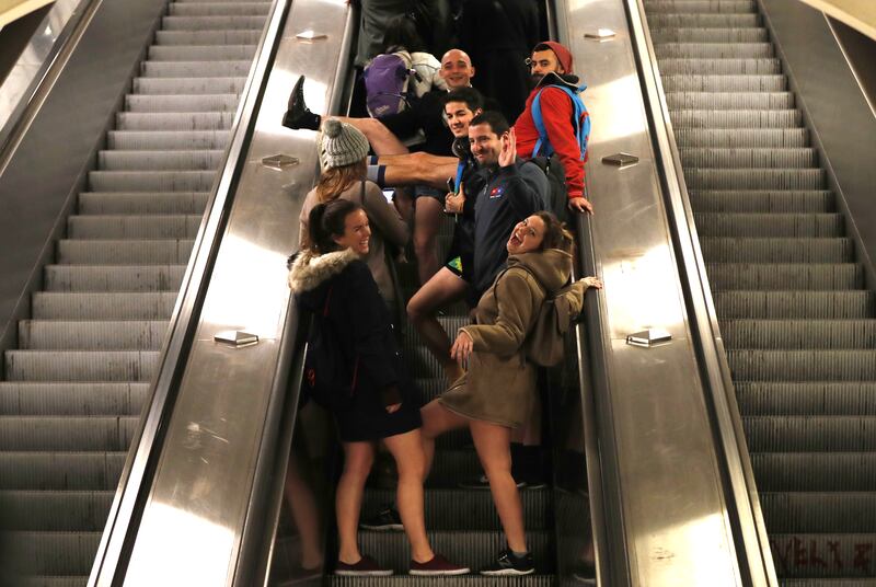 Pantless commuters on the escalator in Prague