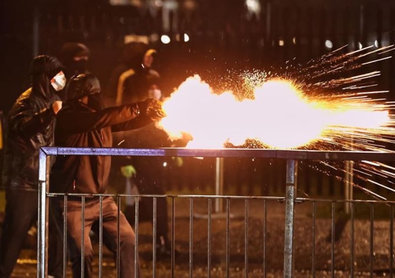 &nbsp;Rioters fire fireworks at the PSNI on the Springfield road, during further unrest in Belfast. Picture date: Thursday April 8, 2021.