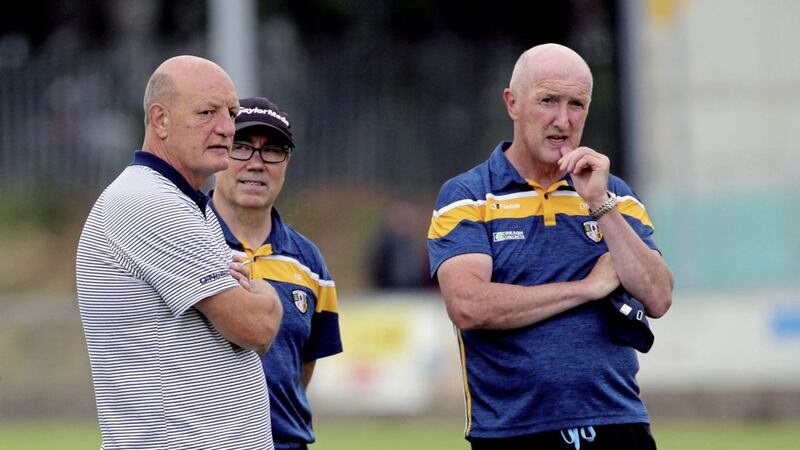 Antrim&#39;s joint-team managers Terence McNaughton with Neil Peden (centre) and Dominic McKinley pictured during the Joe Mc Donagh Cup competition. Picture: Seamus Loughran. 