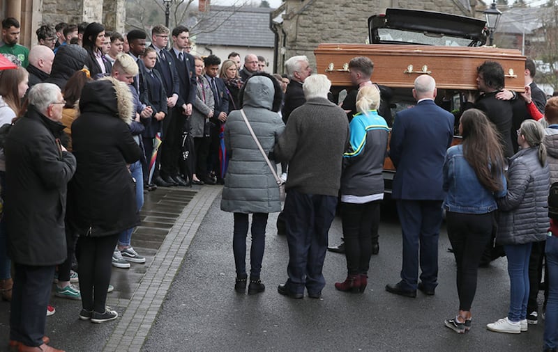 The coffin of Morgan Barnard is taken into St Patrick's Church, Dungannon for his funeral. Picture by Brian Lawless, Press Association
