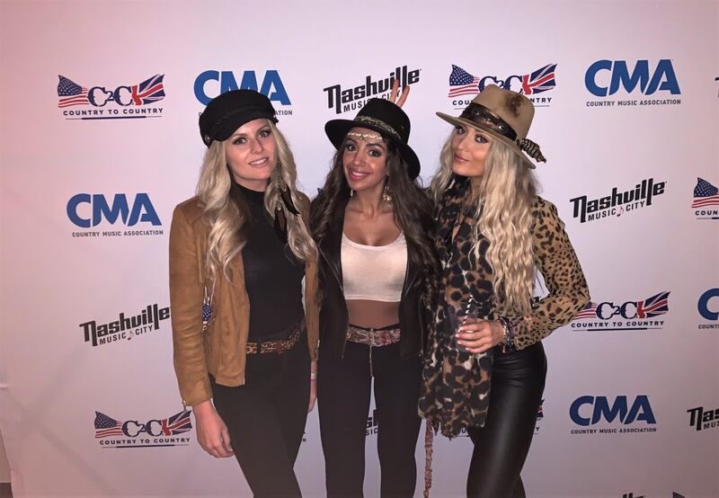 Georgia, Alba and Phillips at the C2C Country to Country music event (Ilona Sawicka/PA)