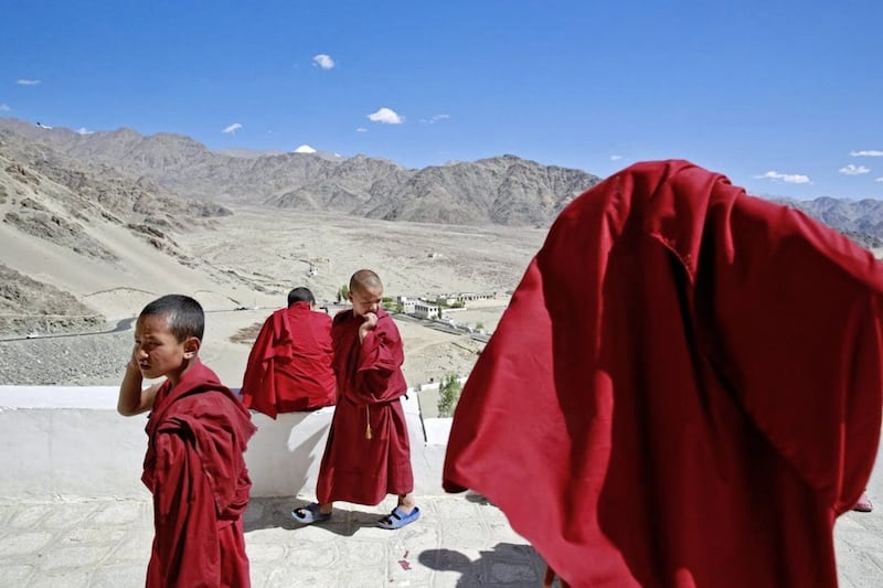 Young monks at a Buddhist monastery in the Indian region of Ladakh in the Himalayas Picture: Cathal McNaughton/Reuters 