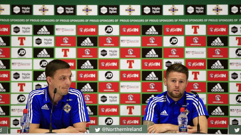 Chris Baird (left) and Oliver Norwood speak to the press following a training session at the Northern Ireland base camp in Saint Georges de Reneins, outside Lyon on Monday<br />Picture by AP&nbsp;