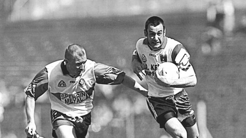 Monaghan&rsquo;s Peter Duffy tries to break away from Derry&rsquo;s Joe Cassidy. Picture by Ann McManus