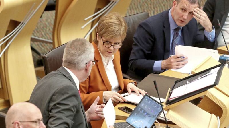 Scotland&#39;s First Minister Nicola Sturgeon with her Brexit minister Michael Russell during a debate on legislative consent to the EU withdrawal bill at the Scottish Parliament in Edinburgh PICTURE: Andrew Milligan/PA 