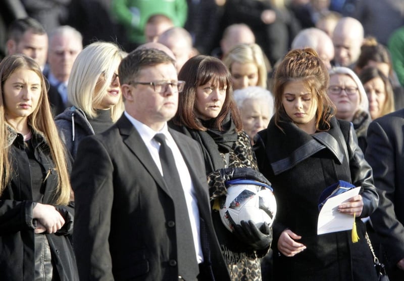 Family and friends at the funeral of former Cliftonville player Paul Straney in Downpatrick yesterday. Picture by Ann McManus. 